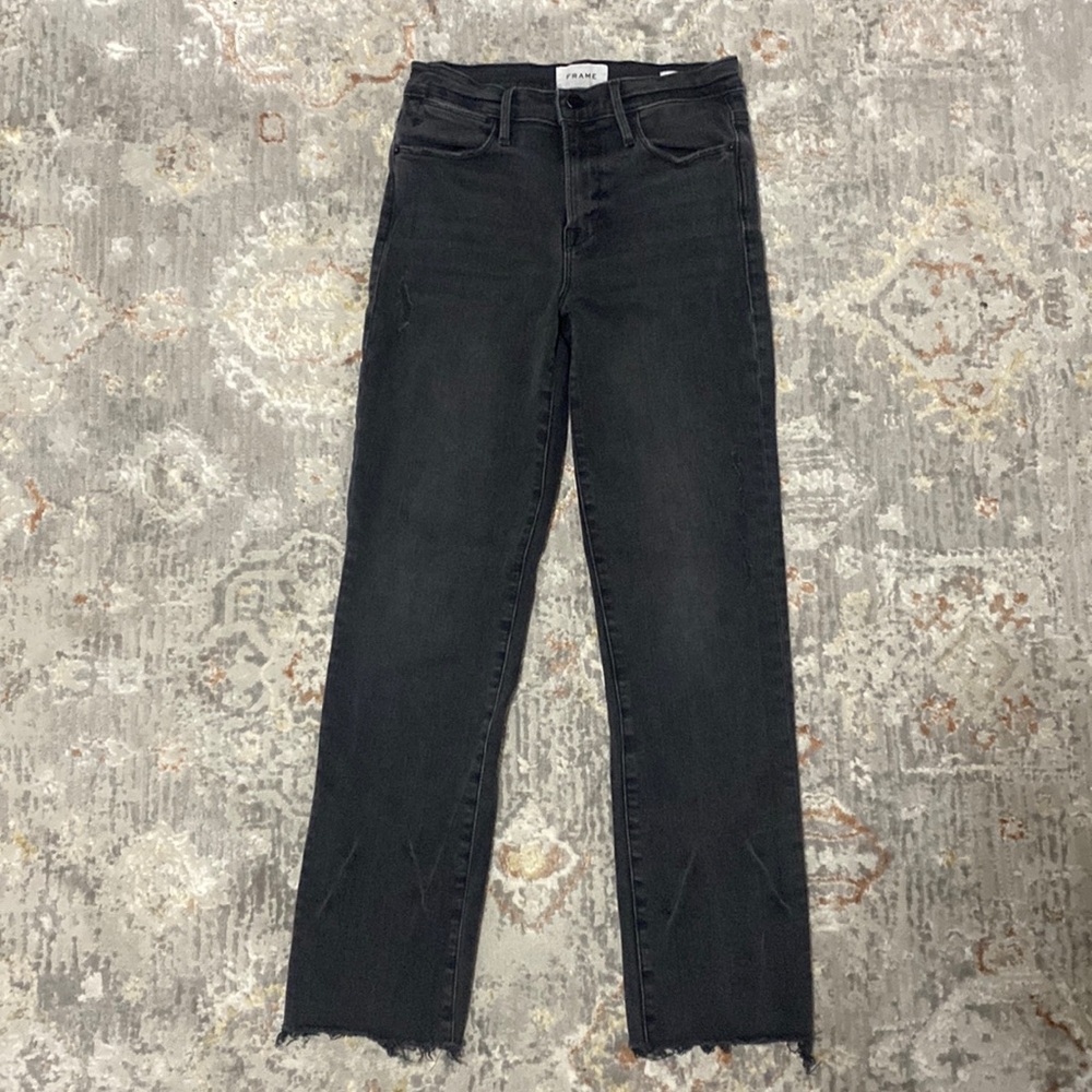 Lightly distressed black jeans